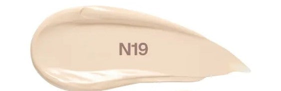 Beige cosmetic product swatch with 'N19' label on a white background